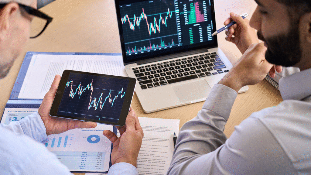Stock market investment tips for beginners in India in 2026, featuring stock charts, financial analysis, and investment planning on a laptop.